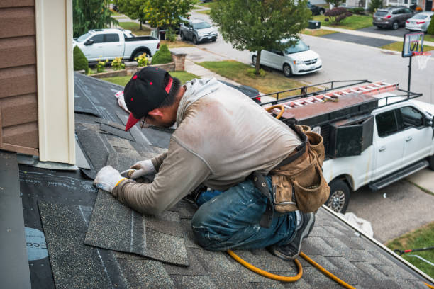 Professional Roofing technician working in Hood, VA